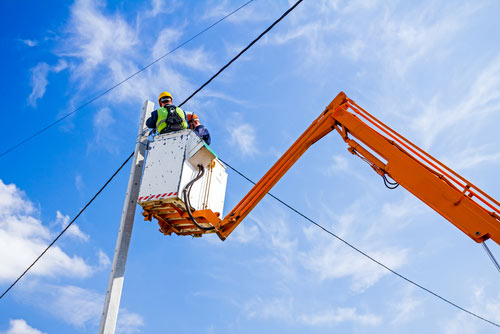 electrician practicing electrical safety at work