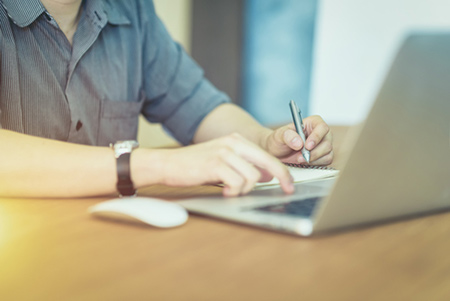 man taking an online course in the electrical industry